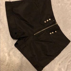 Black shorts. Shiny material. High waisted